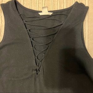 Black crisscross body suit